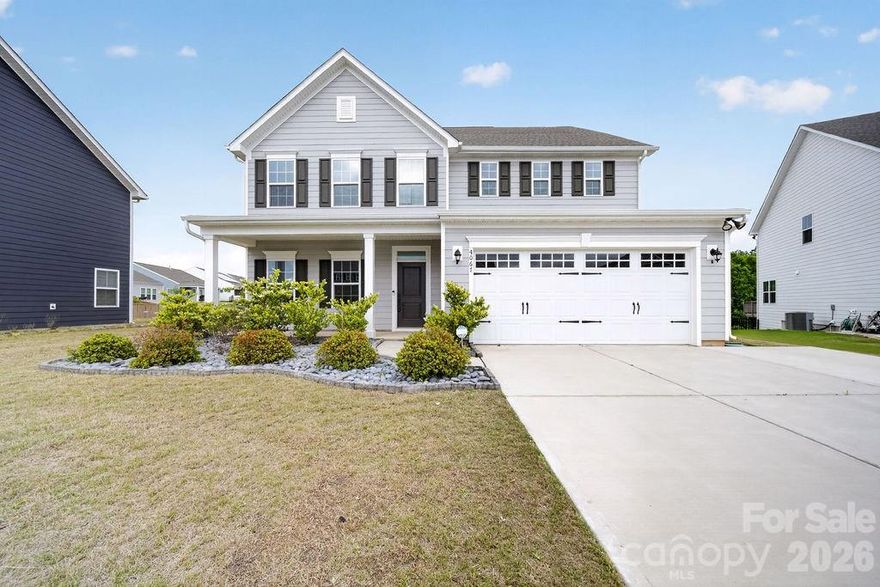 Set on a quiet cul-de-sac in Ansley Park, this community’s most popular floor plan gives buyers what they keep asking for in Indian Land: space that makes sense, a layout that feels easy to live in, and a location that keeps daily life convenient.

Built in 2021 with over 3,000 square feet, the home has the kind of flow that works immediately. The main level feels open and connected without feeling cold or oversized. The kitchen, dining, and living areas all stay tied together, which makes the space easy for everyday life, hosting, homework, conversation, and the normal rhythm of a busy household.

The kitchen is the anchor of the home, with quartz countertops, stainless steel appliances, gas cooking, a walk-in pantry, generous cabinet space, and a large center island that will probably be where everyone ends up anyway. It is clean, functional, and built for real use, not just pretty photos.

The dedicated office on the main level is a major plus. It gives you a true separate space for work, planning, study, or simply getting a little quiet when the rest of the house is moving. Upstairs, the loft adds the room every busy household seems to need. It can be a media room, playroom, homework space, fitness area, game room, or second living room. More importantly, it keeps the rest of the home from having to do everything.

The primary suite is spacious and calm, with two walk-in closets and a private bath that gives you the storage, comfort, and function buyers expect in a newer home. Three additional bedrooms are also upstairs, along with the laundry room, which is exactly where most people want it once they have lived with stairs.

Outside, the covered rear porch and fenced backyard give the home another place to breathe. Morning coffee, grilling, pets, play, quiet evenings, and casual get-togethers all make sense here. The yard feels usable, comfortable, and easy to enjoy without feeling like a project.

Seller-owned solar adds meaningful efficiency and long-term value. Ansley Park also offers a pool, clubhouse, playground, and walking trails, giving the neighborhood more than just a nice entrance sign.

The location is one of the strongest parts of the story. You are close to Indian Land shopping, dining, grocery options, medical access, and everyday conveniences, with easy routes toward Ballantyne, Fort Mill, Waxhaw, and the greater Charlotte area.

Practical, polished, well-located, and easy to live in, this Ansley Park home brings together the pieces buyers are looking for without asking them to compromise on space, comfort, or convenience.

* pictures are virtually staged.