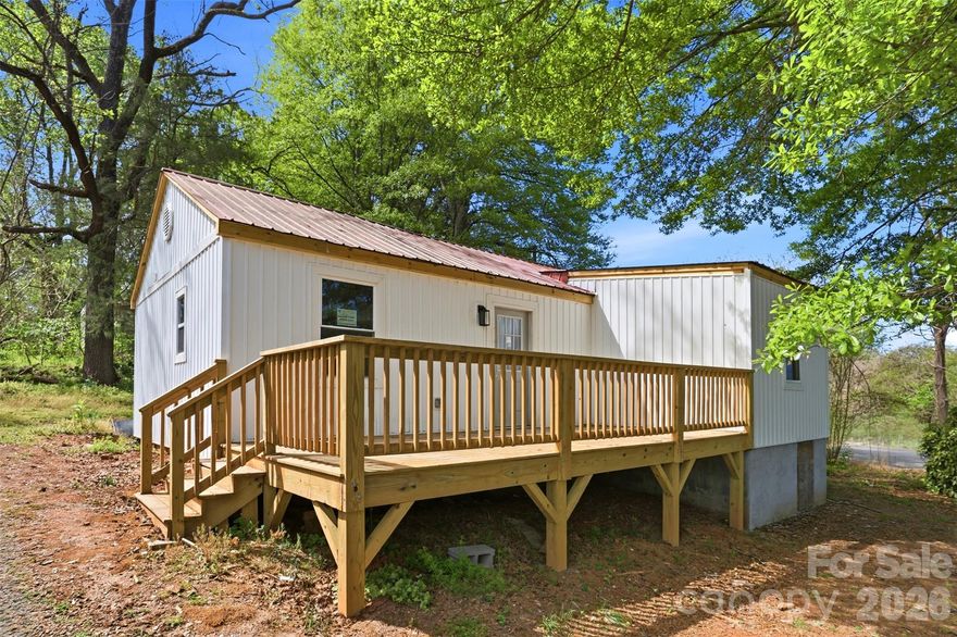 Welcome to 1601 Sigmon St—where modern design meets effortless, turn-key living at an incredible value. Fully reimagined from top to bottom, this home offers the look and feel of new construction without the price tag.
Inside, you’re greeted by a light, open feel complemented by sleek luxury vinyl plank flooring that flows seamlessly throughout. The designer-inspired kitchen serves as the heart of the home, featuring all-new cabinetry, updated countertops, and a clean, modern aesthetic that feels both stylish and functional.
The bathroom has been thoughtfully upgraded with contemporary finishes, creating a fresh, spa-like atmosphere. Every detail has been considered to deliver a polished, move-in-ready experience.
Behind the walls, no expense was spared—brand-new electrical, plumbing, and a high-efficiency heat pump/HVAC system provide comfort and peace of mind for years to come. Topping it all off is a durable new metal roof, blending longevity with modern curb appeal.
Step outside to enjoy newly built front and back decks—perfect for morning coffee, evening unwinding, or entertaining guests in your own private outdoor space.
This is the perfect opportunity to own a fully renovated home that delivers style, quality, and comfort—without stretching your budget.
