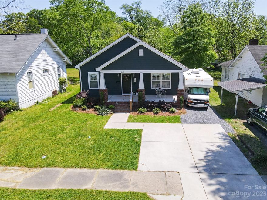 BACK ON MARKET DUE TO NO FAULT OF THE SELLERS...IMMACULATE home with stunning backyard paradise! Built in 2020, this craftsman style home offers 3 bedrooms and 2 full bathrooms.  Open floor plan. Tons of natural light! High quality LVP flooring in all main living areas. Unique, high-end light fixtures! This home is full of custom touches and details. Kitchen has two-tone natural and white cabinets with modern gold hardware. Large kitchen island with plenty of seating space, plus a breakfast nook and full-size dining room! Shiplap accent walls & top down bottom up blinds! Master bathroom features dual vanities, tub/shower combo and luxury tile. 2 secondary bedrooms - all 3 bedrooms have AMAZING closet space! Covered back porch and huge, flat back yard. Beautiful in-ground salt water pool w/ natural gas heater! 10 X 12 shed w/ electrical. Tankless hot water heater! Don’t miss your opportunity to own a one-of-kind-home in the thriving downtown area of Rock Hill only 2 short blocks away!