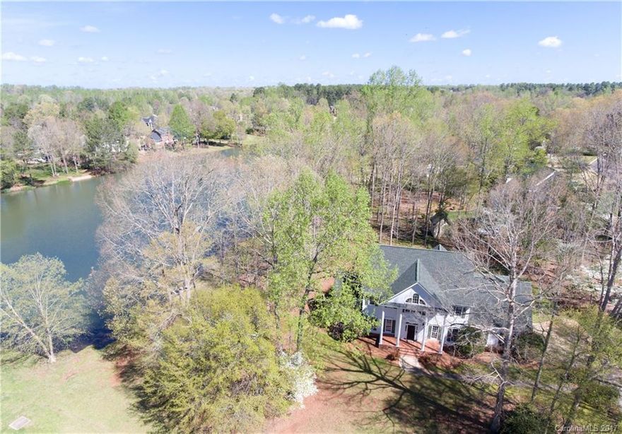 This 3300 Sq Ft waterfront estate in Meadowlakes 2 has it all!  Watch the sun set over the water from the sunroom or deck.  Home features granite in the kitchen, solid wood floors, 2 car garage, walk in attic and so much more!