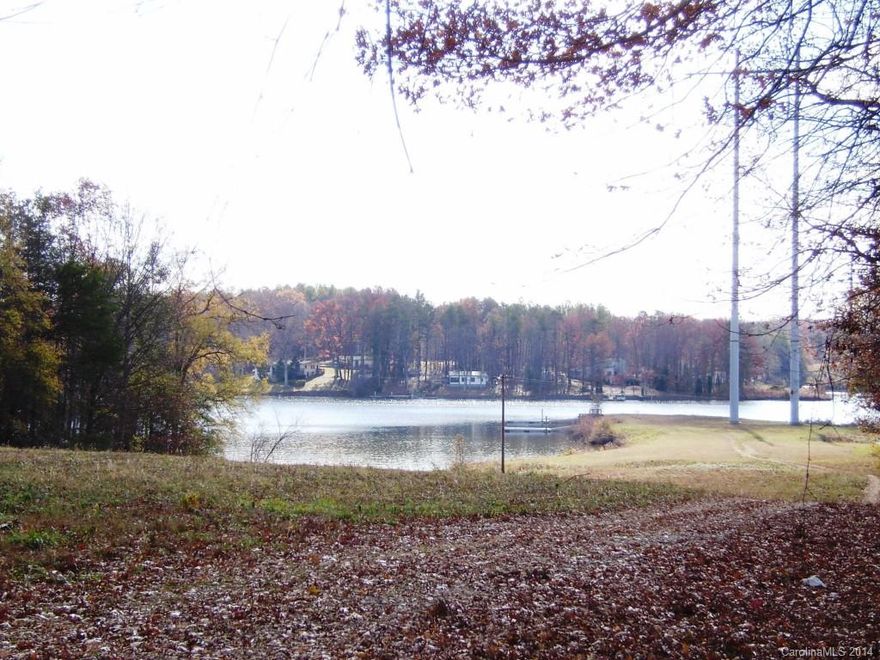 Unbelievable price for Waterfront Home Site with Lake Access. No Dock. Minutes from shopping. Great Schools. Nice level building site. Great Bank Financing.