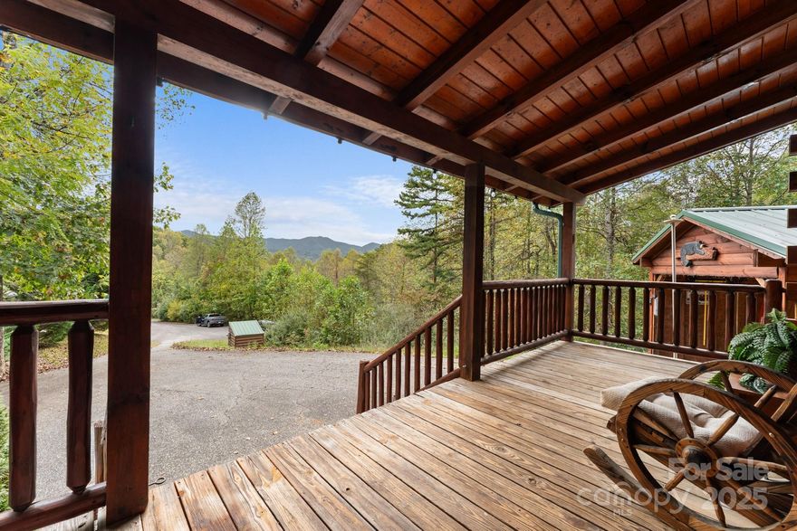 Escape to Your Private Mountain Retreat!
Welcome to your piece of Smoky Mountain paradise! Nestled on a generous 1.43-acre lot in the gated Mountain View Estates community in Whittier, this charming log cabin offers the perfect blend of rustic charm and comfortable living. With easy access to Cherokee, Bryson City, and the majestic Great Smoky Mountains National Park, this is an ideal primary residence, vacation rental, or weekend getaway.

This mountain gem has three bedrooms, with the main bedroom being on the first level. There are two full baths, one on each floor and a half bath on the first level. It is an authentic log home construction with three fireplaces, including a wood burning one on the screened in porch.

If you are looking for outdoor living space, you cannot beat 80 Slow Lane. Many would consider it an entertainer's dream with two attached gazebos and one screened in porch. These will maximize your enjoyment of fresh mountain air. You can spend relaxing evenings free from insects on the spacious screened-in porch. With the wood burning fireplace, you can use the screened in porch year round. It is perfect for enjoying your morning coffee or a quiet dinner. Unique to this property are two beautifully crafted gazebos seamlessly attached to the home's exterior deck and porch system, providing separate, covered outdoor rooms for grilling, dining, or simply relaxing with a book. The gazebo off the main bedroom is wired for a hot tub.

When you are ready to step inside, you will experience a welcoming and cozy atmosphere. Enjoy the warmth of real log walls, hardwood and tile floors, and classic mountain finishes throughout the 1,546 square feet of living space. The living area features a charming fireplace, creating a focal point for cozy evenings. A third fireplace can be found in the main bedroom.

You are approximately a 15 minute drive to Cherokee, home to Harrah's Casino and the rich culture of the Qualla Boundary. Drive approximately 20 minutes west to Bryson City, known as the "Outdoor Capital of the Great Smoky Mountains," offering whitewater rafting, fly fishing, and access to the Great Smoky Mountains Railroad.
You are within close proximity to hiking trails, fishing spots on the Tuckasegee River, and all the natural beauty Western North Carolina has to offer.

This is more than a home; it's a lifestyle. Don't miss the opportunity to own this exceptional log cabin retreat with its incredible outdoor amenities.

Schedule your private showing today!