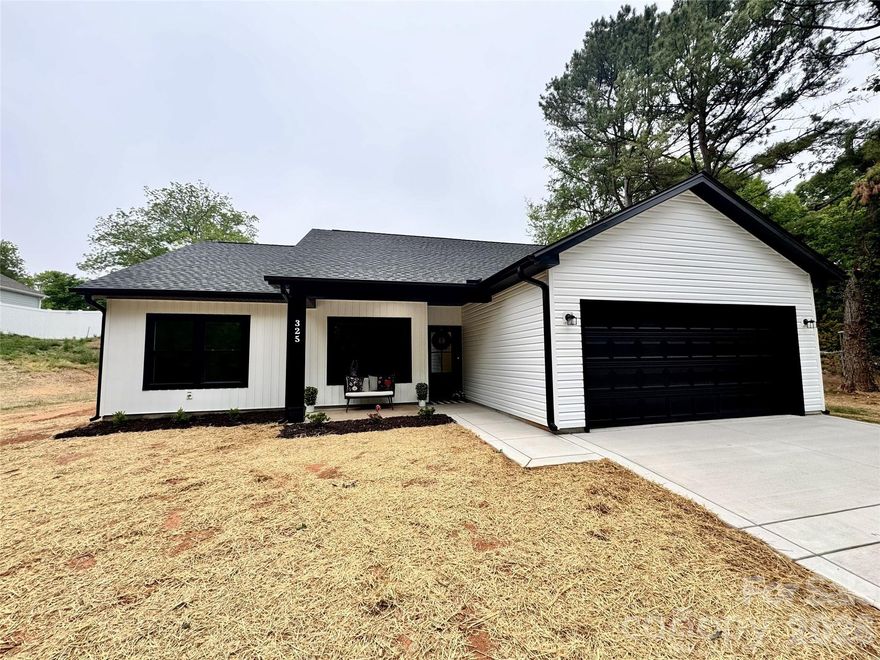 Welcome to this beautifully crafted new construction home (2026) located at 325 N Chapel St in Landis, perfectly situated within walking distance to the charming downtown area! Offering 1,640 square feet of thoughtfully designed living space, this 4-bedroom, 2-bathroom home blends modern style with everyday comfort.

Step inside to an open and inviting layout featuring clean lines, abundant natural light, and quality finishes throughout. The spacious living area flows seamlessly into the kitchen and dining space—ideal for entertaining or relaxing at home. The split-bedroom design provides privacy, with a comfortable primary suite and well-sized secondary bedrooms.

Situated on a generous 0.46-acre lot, the property offers plenty of outdoor space for gardening, play, or simply enjoying the peaceful surroundings. The neighborhood is quiet and welcoming, while still being conveniently close to local shops, dining, and amenities.

Additional highlights include a $14,000 seller credit/concession, giving buyers flexibility to use toward closing costs, or a rate buy-down.

Don’t miss this opportunity to own a brand-new home in a prime location with small-town charm and modern convenience!