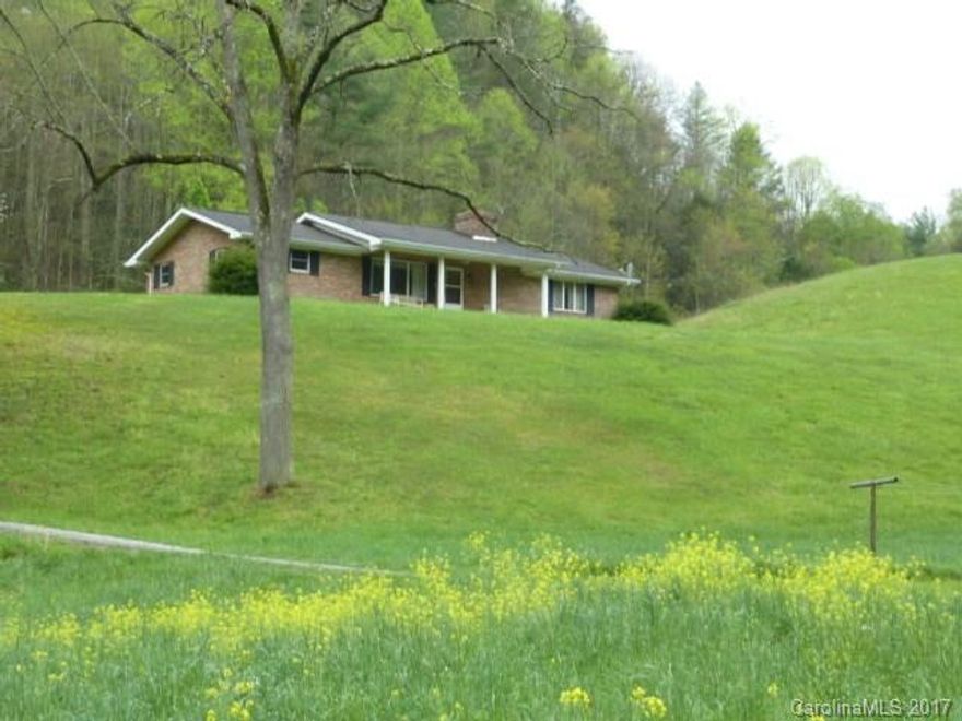 Wow!  This is a truly amazing farm..that hard to come by pastureland and 4 to 5 acres of tillable bottomland land with a creek flowing along side of it....4 barns in very good shape and the house is so well built..needs some updating but thats it..two fireplaces upstairs with wood inserts and a Ashley wood burning stove in basement..would be like having your own radiant  floor heating...whole house attic fan for cooling in the summer.  quiet area and less than 1/2 miles to hwy 208 on paved road