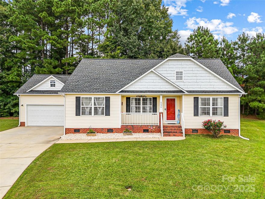 SELLER OFFERING A HOME WARRANTY!! Welcome to Your Dream Home in Rawlinson Acres / Brewington Park! 

Tucked away on a quiet cul-de-sac, this beautifully maintained remodeled 3-bedroom, 2-bath ranch, rocking chair front porch, screened back deck; freshly painted and move-in ready! Loaded with upgrades throughout! Setting on nearly half an acre; offering both privacy and charm in one of the area’s most sought-after communities! Step inside to an inviting open floor plan with vaulted ceilings, gleaming gorgeous hardwoods, LVP flooring, large-format ceramic tile and crisp 6" baseboards throughout! Cozy gas fireplace anchors the living room, creating the perfect space for gatherings. 

Chef-inspired fully remodeled kitchen is a showstopper! Custom solid wood cabinetry, granite countertops and a full suite of new stainless steel appliances including an upgraded installed gas range! Spacious primary suite features a walk-in closet and a stunningly remodeled bathroom with dual granite vanities! Split-bedroom layout provides privacy for guests. Plus secondary bath also boasts an upgraded remodeled custom wood vanity with granite!

Enjoy the outdoors on the covered front porch or unwind on the partially screened back deck overlooking peaceful green space. Additional updated highlights include: - Versatile finished 2-car garage with tall ceilings, fully finished drywall, 220V/110V outlets and a separate rear entrance to backyard! Ideal as an art studio, workshop, or future apartment/office conversion/ rental/ mother-inlaw. For one of the lowest HOA fees of $22 a month, neighborhood amenities include: newly refinished pool, clubhouse, playground, walking/bike trail, and well-lit streets. - Other major updates/improvements: architectural roof, extra attic insulation, new garage door/opener, outdoor lighting and generous attic storage. Freshly painted and meticulously upgraded, this home offers the perfect blend of comfort, style and convenience! PLUS: SELLER OFFERING A HOME WARRANTY!! Don’t miss your chance to call it yours!