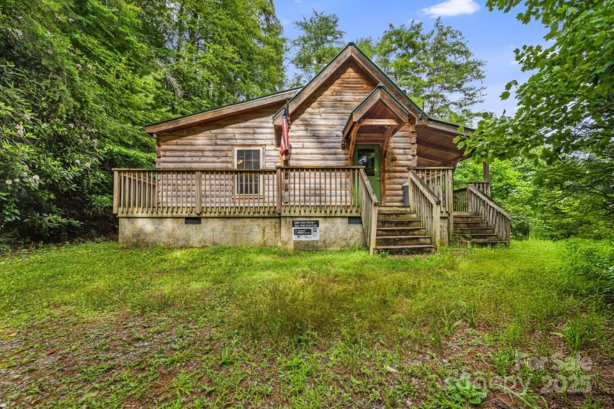 Welcome to 41 Waya Way, a private mountain retreat tucked into the heart of Jackson County. This 2-bedroom, 2-bathroom home offers 1,084 square feet of comfortable living space on 1.18 peaceful, wooded acres. Whether you're looking for a full-time residence, a weekend escape, or a short-term rental investment, this property delivers on lifestyle, privacy, and potential. Inside, the home features a thoughtful layout with a heat pump providing year-round comfort and a wood stove for cozy evenings. Located minutes from Harrah’s Cherokee Casino, the Great Smoky Mountains National Park, and the Tuckasegee River, the home is ideally positioned for outdoor enthusiasts, nature lovers, and those seeking a slower pace of life. The land offers freedom to expand, garden, or simply enjoy as is. This is a rare opportunity to own a piece of Western North Carolina that offers both seclusion and convenience in one of the region’s most scenic and sought-after areas.