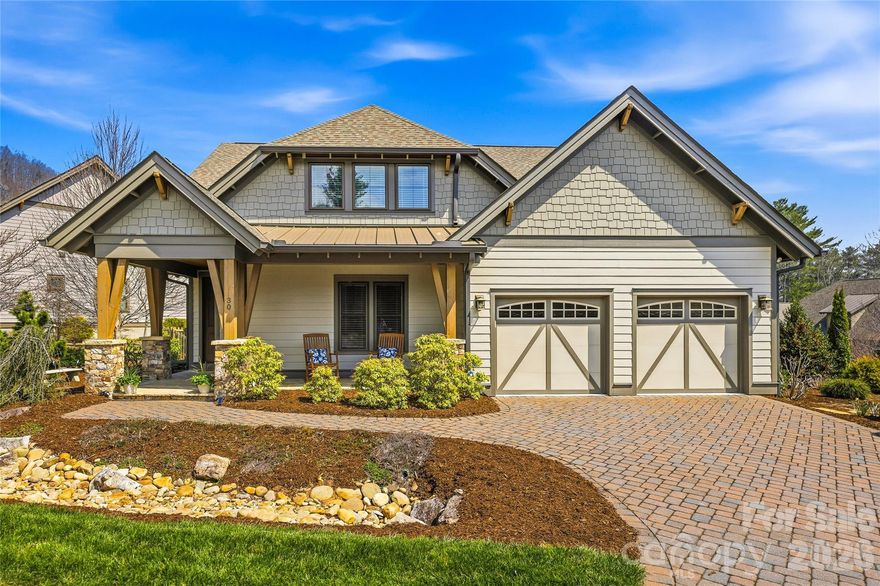 In the gated mountain community of Southcliff,  30 Stills Creek Loop offers a refined blend of comfort, thoughtful design and serene natural surroundings just minutes from Asheville. The home features a main-level primary suite and an open-concept floor plan that seamlessly connects the kitchen, dining and living areas, ideal for everyday living and effortless entertaining. Expansive windows fill the interior with natural light while showcasing the peaceful wooded setting. A dedicated media room provides space to relax, unwind or host movie nights. Outdoor living is equally inviting, with a screened porch, stone patio and fenced yard creating a private retreat to enjoy the mountain air year-round. Additional highlights include a two-car garage and an encapsulated crawlspace for added efficiency and storage. Residents of Southcliff enjoy preserved natural beauty, miles of scenic hiking trails, and convenient access to Asheville’s renowned dining, arts and cultural scene.