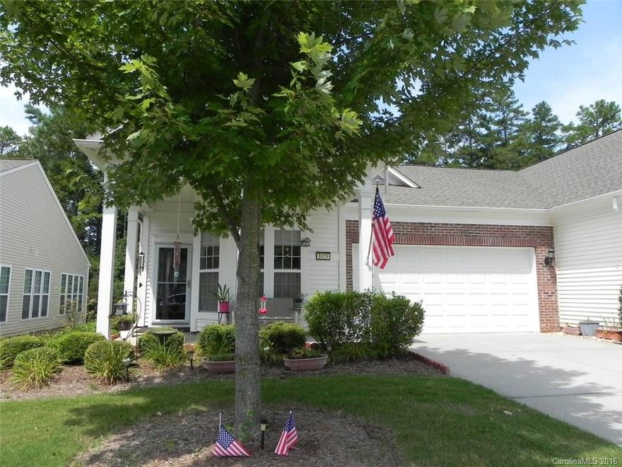 Location! This bright cozy Kenwood Villa sits on the lake with woods behind, easy walking distance to shopping, Amenity center, golf, tennis and much more.  The interior has hardwoods in the living area, tile in sunroom, baths and laundry, carpet in the bedrooms.  It has Corian counters, tile backsplash, recessed lighting and much more.  Come check out the community and the active adult lifestyle of Sun City Carolina Lakes.