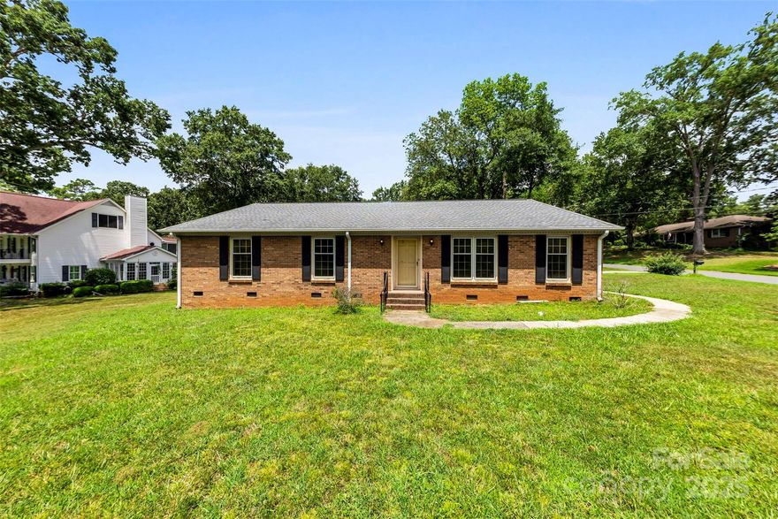 City living is just minutes away from this quiet, well-established neighborhood. This all-brick, ranch is situated on a large, level corner lot and features 3 bedrooms, 2 bathrooms, and an outdoor utility room connected to the house. Its central location means there’s something for everyone, with Quail Hollow Golf Course and SouthPark shopping just minutes away!  If you’re looking for a home near everything- where you can add your personal touch, this is the one! Property to be sold As-Is.