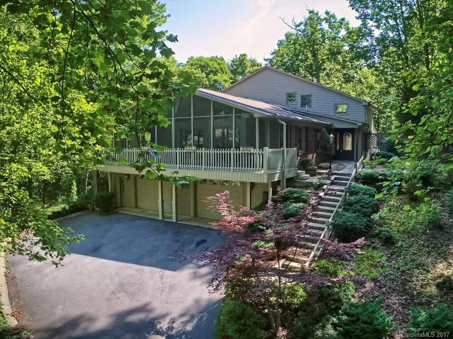 Outstanding one of a kind home in desirable Haywood Knolls. This 3 bedroom, 3 bath home has been beautifully remodeled with an addition of spacious 2nd master suite w/balcony. Marble tile foyer welcomes you into this light filled home. "Tree house room" perfect for relaxing. Kitchen boasts a charming center island with sink, granite counters, French door refrigerator. Flow of the lower level begs for entertaining. The .65 acre lot is beautifully landscaped rushing waterfall into koi pond.