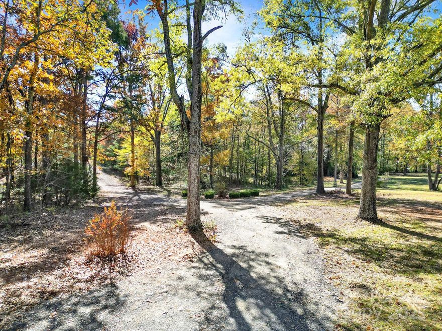 Discover 19.84 acres of natural beauty featuring two fenced pastures, a picturesque pond, and gently rolling terrain dotted with mature hardwood and pine trees. This property offers the perfect blend of open area and wooded privacy—ideal for building your dream home with large workshop or enjoying peaceful country living. Some areas have been cleared, making it easy to start your next project right away. Experience the quiet charm and possibilities this beautiful tract provides as well as observing the abundance of animal life.