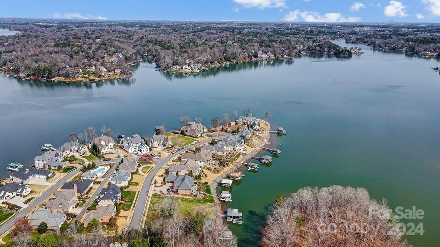Beautiful waterfront homesite located on a serene cove opening to the main channel of Lake Wylie.  Located in Joslin Pointe, a lovely gated community with luxury custom homes, gas lantern street lights, a community pool, clubhouse, and lake views throughout. Build your forever dream home on this premium homesite, and enjoy lake living today! You'll love the natural shorelines, beautiful hardwood trees, and gentle topography for easy access to the lake. Amazing dock already in place with covered slip and boat lift. Convenient location close to shopping, dining and I-77.