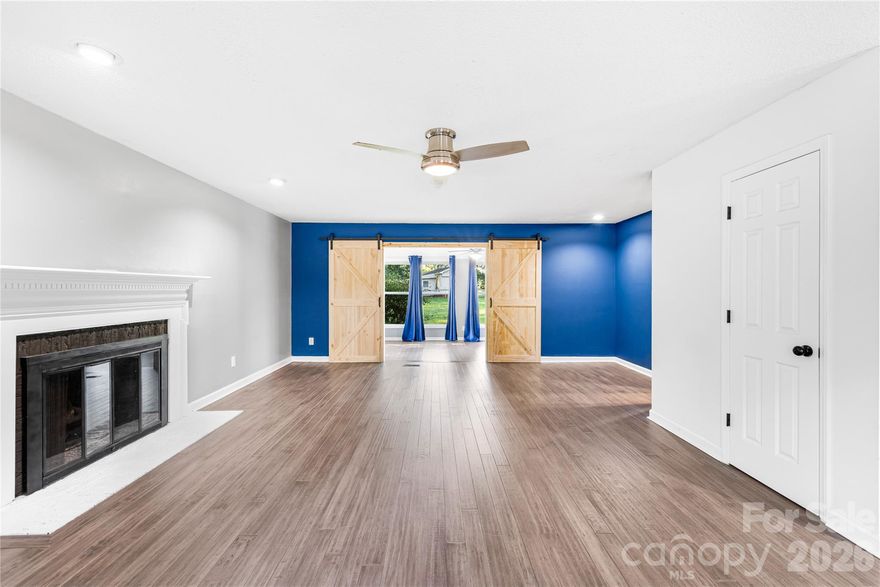 Welcome to your dream home in the heart of Shelby,  just a short drive to beautiful Moss Lake! This charming 3-bedroom, 2.5-bath home perfectly blends warmth, comfort, and style, making it ideal for everyday living or entertaining guests. From the inviting entryway, you’re greeted by an open-concept layout filled with natural light and stylish LVP flooring. The spacious living area features a cozy fireplace and flows effortlessly into a bright sunroom,  perfect for morning coffee or quiet evenings at home. The kitchen showcases stainless steel appliances, ample storage, and a cheerful breakfast nook.  Upstairs, the primary suite offers a peaceful retreat with a walk-in closet and ensuite bath featuring dual vanities. Two additional bedrooms provide comfort and flexibility for guests, or a home office. Step outside to enjoy the Trex deck, fire pit area, and fenced backyard, an entertainer’s dream with plenty of space for gatherings, play, or relaxation. The home is also wired for a generator. With its convenient location, thoughtful updates, and inviting spaces inside and out, this Shelby gem is ready to welcome you home.