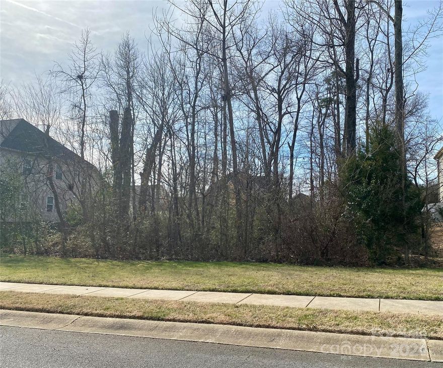 Beautiful wooded lot in established Rhynes Estate subdivision. Convenient location. a must see for builders.