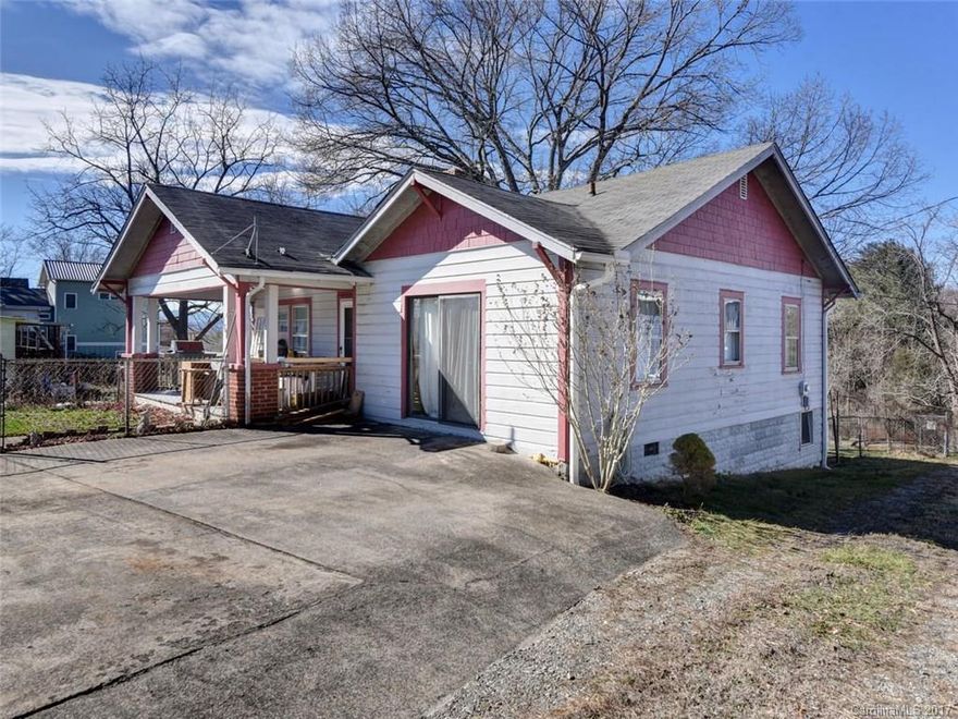 Enjoy all that West Asheville has to offer in this cozy bungalow located moments from the eateries and shops of Haywood Road. Play or garden in your large green space or host a bbq on your screened in porch off the back deck. Featuring hardwood floors, covered porch, 2 BR/2BA, and over a third of an acre. With each bedroom having its own private bath, this house could be a great starter home or rental, all bundled into the perfect package of functionality and location.