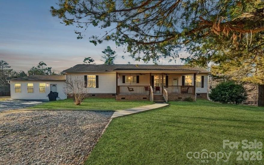 Set on 2.15 acres down a quiet private road in York, this 2004 home offers modern living with plenty of space inside and out. The main home features 3 bedrooms and 2 bathrooms across approx. 1,800 square feet, with an open layout!

One of the standout features is the attached apartment/in-law suite— complete with its own kitchen, laundry, and full bathroom. It’s the perfect setup for extended family, guests, or even potential rental income.

Outside city limits with NO HOA, this property offers the freedom and privacy you’ve been looking for. With over 2 acres to enjoy, you’ll have room to garden, play, or simply relax in a peaceful country setting.