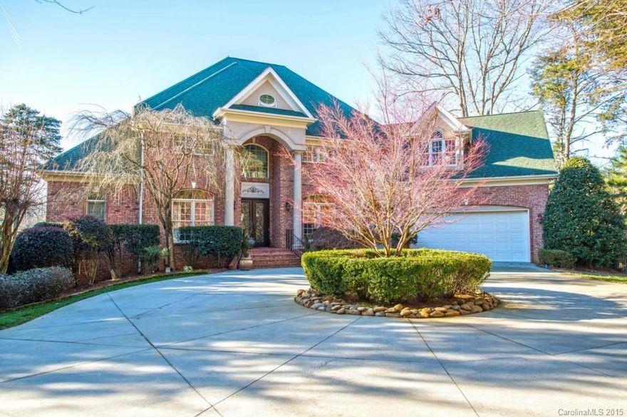 Gated waterfront estate on over 3 acres in Cornelius!!! Master suite located on the main. Great outdoor living with salt water pool & hot tub and full size basketball court. Gourmet kitchen with granite counters and stainless steel appliances.