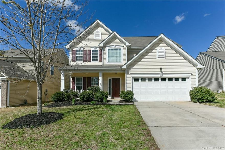 You will love calling this Almond Glen house your home.  Perfect location - close to NC, with low SC taxes,  and sought after Indian Land schools.  Spacious open floor plan with formal dining room, granite kitchen, and bedroom downstairs.  Enjoy evenings on the back patio with a firepit and fenced yard.  Call now - this one will not last long!