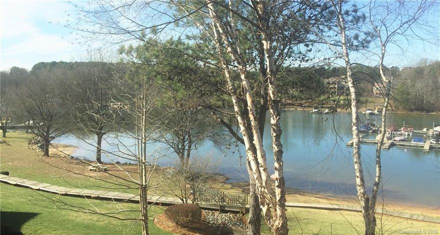 Fully upgraded WATERFRONT Penthouse End unit 2BR/2BA condo with ELEVATOR!  Lake living at its best! Enjoy your view of Lake Norman and Port City Club from the GR, MBR and covered porch. Brand new SS appliances, new granite in Kitchen and Baths, new tile backsplash, all new light fixtures, ceiling fans in BRs and GR, new hardware and faucets. Boat slips can be leased. Walk to area restaurants, shopping and grocery.