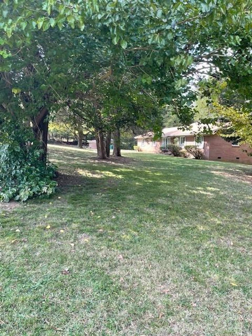 Great location in the Steel Creek area, close to the Rivergate shopping area.  Across from the Emergency Room. The property has a 2000 ft. brick structure.  Property has been rezoned for commercial use. Do not walk on the deck or bridge in the back yard. Walk the side road to the back of the property.

Property also listed under commercial MLS 4075404