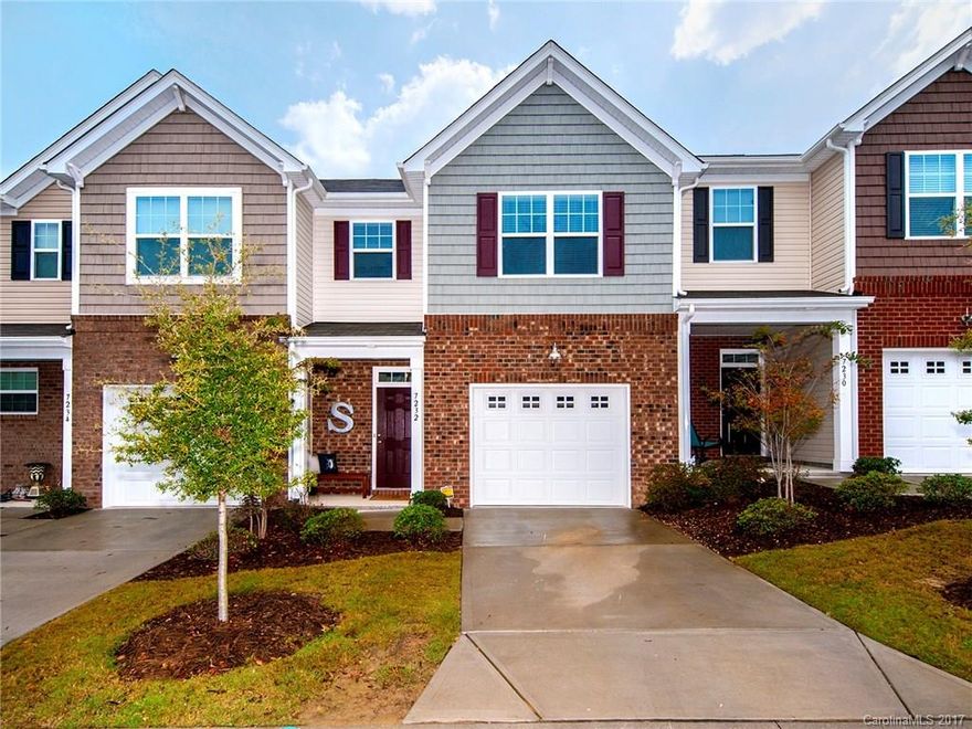 Talk about a pristine property! This townhouse is like new but with all the upgrades. Beautiful wood floors, granite countertops in the kitchen, stainless steel appliances, a warm fireplace to snuggle up in front of, a covered porch with a fenced in yard and the list goes on and on. Hurry and you can be home in time for the holidays!