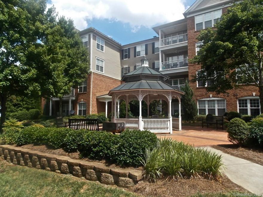 LOCATION LOCATION! Stylish 2 bed 2 Bath condo in prime South Park location.  Highly sought after floor plan on 2nd floor w/ open living, dining, & kitchen areas. Upgraded Corian countertops, white cabinets, SS appliances, & hardwoods in kitchen. Large MB, master bath w/ dual vanities & walk-in closet.  Cozy fireplace in family room. Convenient to Southpark Mall, restaurants, Uptown, & Light Rail. Large balcony. Easy access to elevator & excellent building security in a pet-friendly complex.