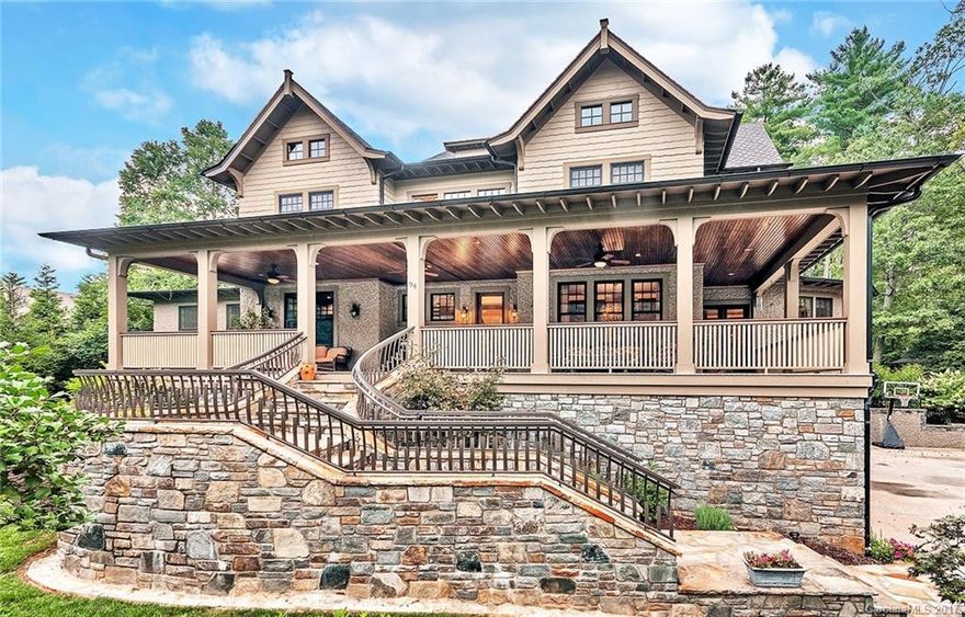 Fantastic 3-story mountain shingle home on plum lot w/coveted privacy & seclusion sited across from historic log cabin & green trails.  Relax & entertain on enormous covered porches reminiscent of old inns, and enjoy lovely fenced grounds with ample room for gardening & play.  Clean lines, fine finishes & ample light define the interior. A commercial kitchen, paneled study, LL office/guest suite and elevator to all levels are just some of the hallmarks. Plenty of flex space for your custom use.