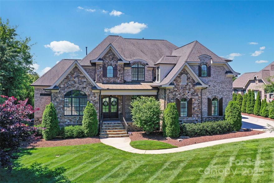 The one you've been waiting for! Immaculate luxury home that feels like new construction, w/unrivaled privacy on a large flat cul-de-sac lot in prestigious amenity-rich & gated Providence Downs South. Floor plan is designed to entertain and backyard designed to unwind. Home features hardwoods throughout, beautiful architectural details, soaring ceilings, & a relaxing vibe. Primary on main w/large spa-like bath & massive walkin closet, office w/vaulted ceilings, 2 story great room that opens to allow outside in & views of the secluded backyard oasis. Massive Chefs kitchen that is open to family rm, Monogram appliances, range w/pot filler, walk in pantry, and a sprawling island for entertaining. Upstairs find 3 generously sized secondary bedrooms (one w/loft area!) each w/ensuite baths, enormous laundry room w/sink and storage, and a large bonus room. The standout feature of this home is the private backyard, w/power screen porch and heated saltwater pool. Pride of ownership throughout.