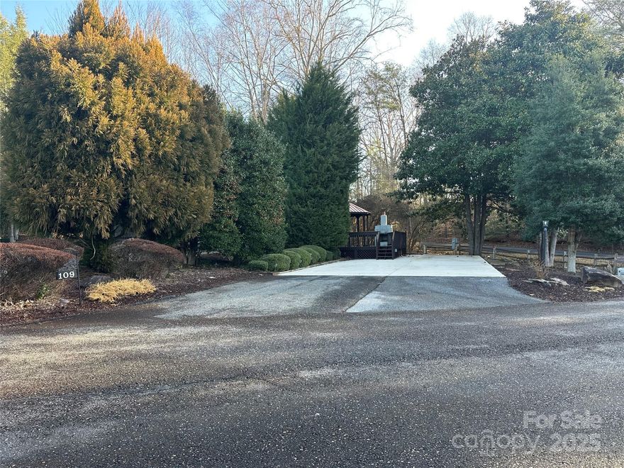 Don't miss this prime Class A motorcoach pad located in Apple Valley Farms, Lake Lures premier motorcoach destination. This fantastic corner lot is one of the largest in the community providing plenty of space and privacy. Enjoy the large deck with a gazebo and outdoor fireplace for the finest in outdoor living and entertaining. Community provided WIFI transmitter located at the corner of the of this property providing optimal reception for streaming and internet access. Rumbling Bald amenities are accessible to owners through guest passes which include the beach, fitness center, pools and more. In addition Apple Valley Farms has a club house and laundry facilities for owner use.