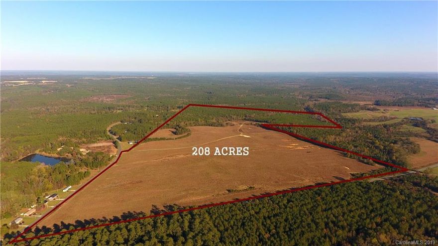 Rare Opportunity!!! 209 Acres with 105 Acres open in Agricultural Fields and 104 AC in Pine Plantation.  Rural corner track ready to develop into a large poultry farm, cattle or horse farm.  Timber near the first "thining" & hardwoods along a beautiful Creek with GREAT Home Sites!  This tract can be seen from over 4000 feet of road frontage and many farm roads throughout the property.  A unique site in Anson County to develop a business,  enjoy year round recreation or build a secluded homestead.
The Historical "Color Purple" Farm joins this tract on its southern boarder!  
Seller Welcomes Solar Lease Offers.