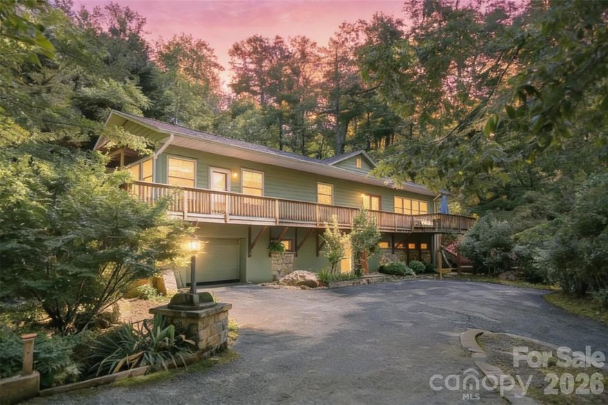 Tucked away on a private road in the desirable Rixhaven community, 75 Cougar Lane offers the perfect blend of seclusion, space, and thoughtful design. This spacious 4,282 sq ft home sits on 1.45 wooded acres and features an open floor plan with hardwood floors, soaring ceilings, and abundant natural light. The main level boasts two bedrooms with en-suite baths, a powder room, a cozy living area with gas fireplace, and a chef’s kitchen with granite countertops, island, and black stainless-steel appliances. Upstairs, a flexible loft area is ideal for a home office or library. The fully finished walk-out lower level includes two large rooms with full baths—perfect as guest suites, media rooms, or studios—plus a charming art space. Enjoy peaceful mornings on the deck surrounded by nature, with easy access to charming downtown Saluda, yet immersed in peaceful seclusion. A rare find offering privacy, functionality, and timeless mountain charm.