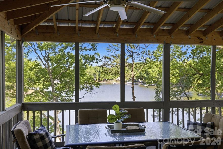 SPECIAL OPPORTUNITY! WATERFRONT 4 BR + extra room with closet home sitting on 3+ ACRES & 402 feet of waterfront w/ a MASSIVE 1800+ sq ft detached TALL GARAGE with OVERSIZED doors for RV's & Equipment!) & private (new in 2024) LARGE low maintenance DOCK! Newly painted interior! The mega detached garage (1831 sq ft) offers incredible space for a large RV, boat, multiple vehicles, and all your lake gear. Enjoy evenings on the screened porch, playing on the lake or land or sit back and relax in the hot tub after a day on the water! The attached 2 car garage has new epoxy flooring! New 2026 tax value listed. Tax rate and tax amount listed are 2025 figures; new 2026 tax rate projected TBD mid-2026. Pier permit with Cube Hydro includes a $100 annual renewal fee and a one-time $175 pier transfer fee to be paid by buyer at closing. Preapproved buyers welcome!
