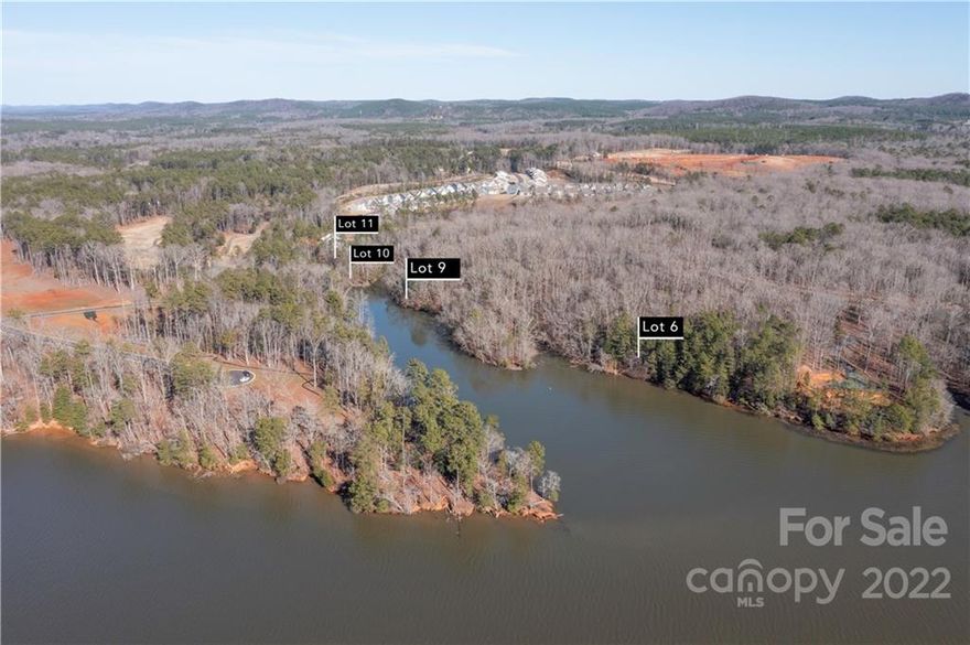 Part of the newly subdivided portion of Swift Island Plantation on Lake Tillery, Lot 11 is over 1.34 acres with more than 190 feet of shoreline on the homesite lot. There is also a second parcel that conveys with this property which has over 400 feet of shoreline and is a point looking out of the cove. The views are beautiful and the water depth is great. Hardwoods are abundant and the subdivision is serviced by county water / city sewer along with underground utilities. Swift Island Plantation is a gated community with an established HOA. Current Duke Energy guidelines show this property qualifies for a lease which allows for a boathouse and bulkhead. This is to be confirmed by the buyer with Duke Energy. Swift Island Plantation website is www.SIPHOA.com for more info.