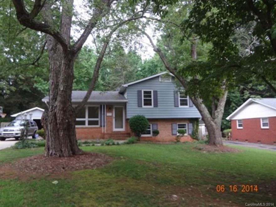 Beautiful yard with large trees. The back has a large built up terrace and patio overlooking an in ground pool. There is a large workshop area inside the detached garage. Hardwood floors in 3 of the bedrooms, hallway and living room. The sunroom on lower level overlooks the pol and has ceramic tiles. The yard is extensively landscaped.  Kitchen has stainless steel stove, dishwasher and microwave. This home is a step above the rest as it has been renovated and updated.
