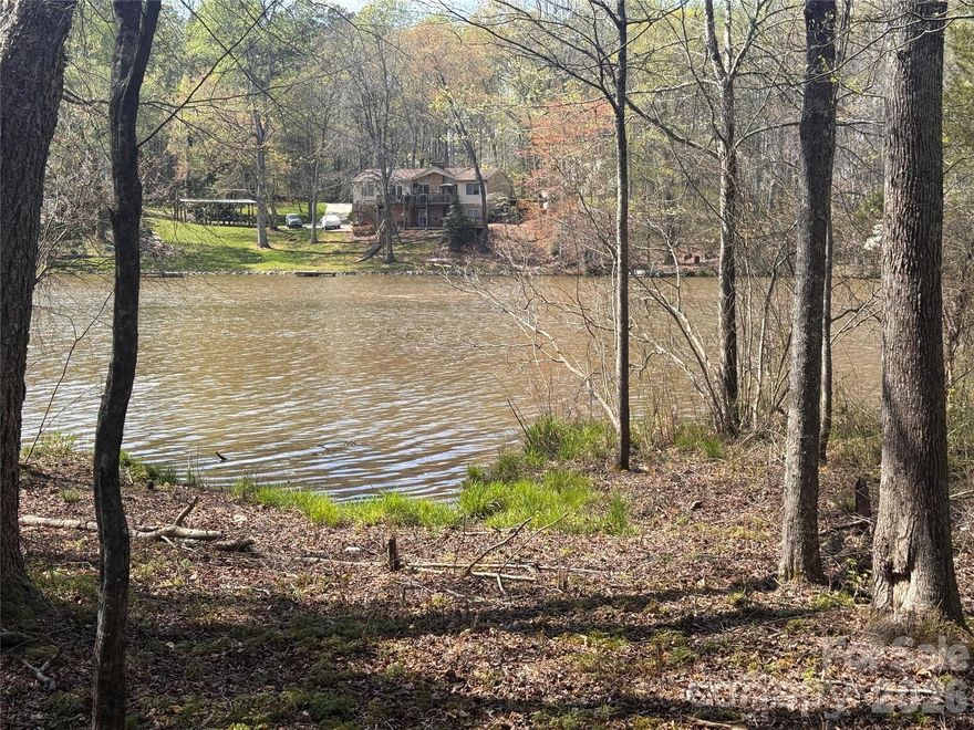 Located in a quiet cove on Moss Lake, this 1.4± acre waterfront lot presents a great opportunity to own lakefront property in Shelby. This vacant land tract offers a peaceful, private setting with excellent potential for a primary residence, vacation home, or long-term investment.
The property is accessed by a 50-foot easement from Thamon Road, providing added privacy while still allowing convenient access to both Shelby and Kings Mountain. The gently rolling landscape features multiple potential building sites, many of which offer attractive views of the water.
Enjoy direct frontage on Moss Lake perfect for fishing, kayaking, or simply unwinding by the shoreline. The protected cove location offers calmer waters and a more secluded atmosphere, making it an ideal setting for your future lake retreat. (No Dock Allowed)