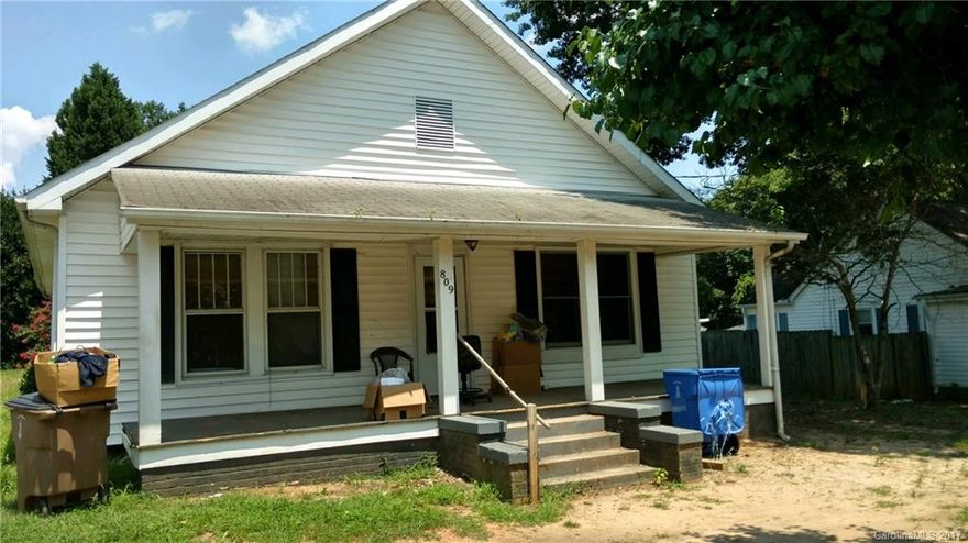 2BR w/extra room that could be used as a third bedroom. Central heat and air. Sold as-is.