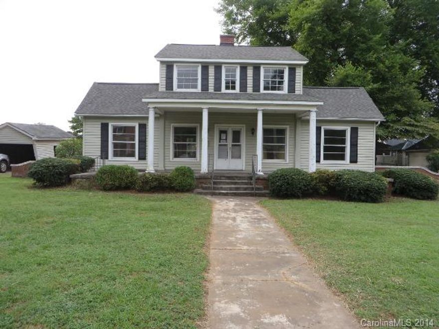 Charming  4 bedroom, 2 bath home in the City of Lincolnton, just blocks from the center of town, nice large covered front porch, fenced back yard, 2 fireplaces, formal living and dining rooms, plenty of storage & closets, original wood floors galore & French doors, double archways separates formal living and family room, roomy kitchen w/nook. THIS ONE IS SOLD AS IS!!