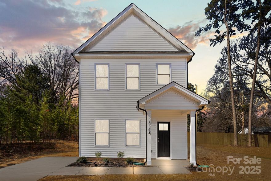 Welcome to 1310 Essex Street in Gastonia, a stunning new construction home that perfectly blends modern style with everyday convenience. This beautiful 3-bedroom, 2-bath property offers an inviting open floor plan with LVP wood flooring throughout the main level, creating a warm and welcoming atmosphere. The modern white kitchen is a true highlight, featuring sleek cabinetry, stainless dishwasher and stove, ample counter space, and all the contemporary touches you've been looking for. Upstairs, you'll find three spacious bedrooms and two full bathrooms, providing the perfect setup for both family living and hosting guests. The exterior of the home boasts low-maintenance vinyl siding, allowing you to spend more time enjoying your new home and less time on upkeep. With its move-in-ready appeal and thoughtful design, this home is a must-see for anyone seeking a fresh start in a vibrant area. Schedule your showing today!  Stainless Dishwasher and Stove to be installed.