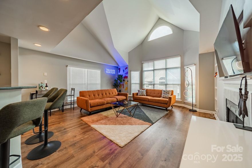 Welcome to urban luxury living at its finest! This stylish 2-bedroom, 2-bath upper-level condo is located in the heart of Uptown Charlotte’s historic Fourth Ward. Inside, you'll find an open floor plan with hardwood floors, large windows, and a modern kitchen featuring granite countertops and stainless steel appliances. The main-level bedroom is ideal for guests or a home office, while the oversized upstairs primary suite offers a spacious, private retreat.
A brand-new roof (2024) and assigned covered parking add peace of mind. . Unit offers 1 covered parking spot and additional parking available through the city. 

Enjoy resort-style amenities including a fitness center, pool, clubhouse, community center and new grilling stations—all just steps from Charlotte’s best dining, sports, and entertainment. Don’t miss your chance to own a piece of Uptown living. Schedule your showing today!