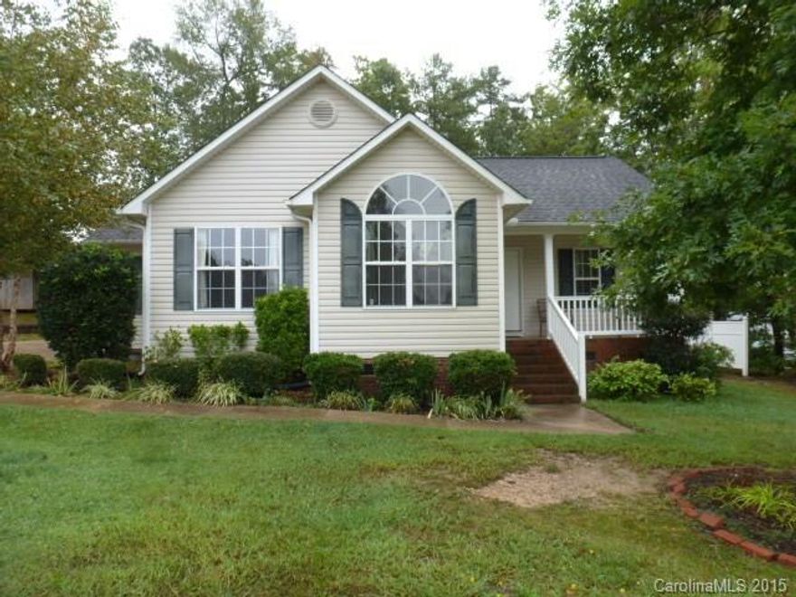 Sit on your front porch or lounge on your back deck in this 3BR, 2BA home, features cathedral ceilings and hardwood floors, dining area opens to deck on back. Appliances remain, updated roof.