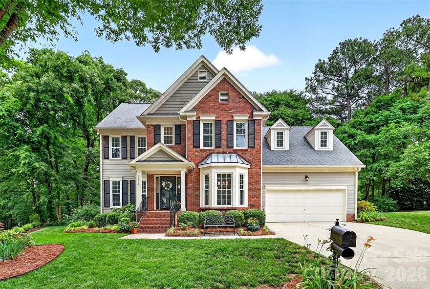 Tucked away on a cul-de-sac in Wilshire, this move-in ready home delivers a true 10/10 location and the lifestyle buyers are chasing in South Charlotte. Minutes to I-485, SouthPark, and Ballantyne, with walkable greenway access for effortless daily walks. Step inside to a bright two-story foyer, freshly refinished hardwoods, neutral interior paint, and on-trend light fixtures. On the main level, French doors open to a private home office, playroom, or quiet retreat. The formal dining room, anchored by a bay window, overlooks mature trees and the neighborhood’s established charm. The kitchen is refreshed, featuring updated cabinetry and like-new stainless steel appliances, a walk-in pantry with wood shelves, and a cozy living area with a white-brick gas fireplace for that classic Southern vibe. Even the bathrooms have flair! Upstairs features luxe NEW carpet and three true bedrooms plus a generous bonus room or fourth bedroom. Outside is where Carolina living comes to life. You can feel the love that has poured into each flowering wonder, bringing you daily joy, while birds sing the perfect melody. A spacious deck, irrigation, and your own secret garden path to escape to the greenway. Major systems are already handled with dual HVAC replacements and a brand new hot water heater with an extended warranty. Pride of homeownership beams. Cul-de-sac positioning, greenway access, and one of South Charlotte’s most convenient locations to all the grocery chains you love, restaurants, golf, the list goes on! Zoned for highly regarded schools, including McAlpine Elementary, South Charlotte Middle, and the new Ballantyne Ridge High, with additional school options all conveniently located with this location. Refrigerator and garage refrigerator convey. Washer/Dryer negotiable. SHOWINGS START THURSDAY! See the update sheet, virtual tour, and floor plan!!