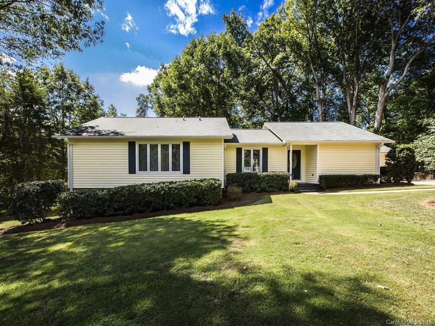 This beautiful ranch is tucked away on almost ¾ of an acre. Lovely renovated kitchen features granite counters and the updated appliances will remain.  The huge garage with walk-up storage is a nice plus and the serene deck overlooks a large treed lot. Amazing find in Fort Mill!