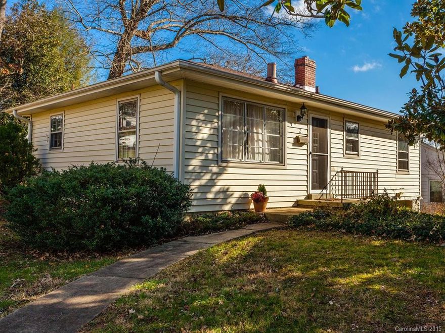Sunshine filled 1950's home on large corner lot.  Three bedrooms and a bath sit atop an unfinished basement.  Gas furnace and central air condition. Quiet street.  Corner lot ideal for garage apartment or shop/studio.  Lot cannot be subdivided.  Hardwood floors, basement garage, dishwasher, refrigerator and dryer included.  Huge magnolia and oak trees.  Easy walk to Universal Joint via sidewalk.