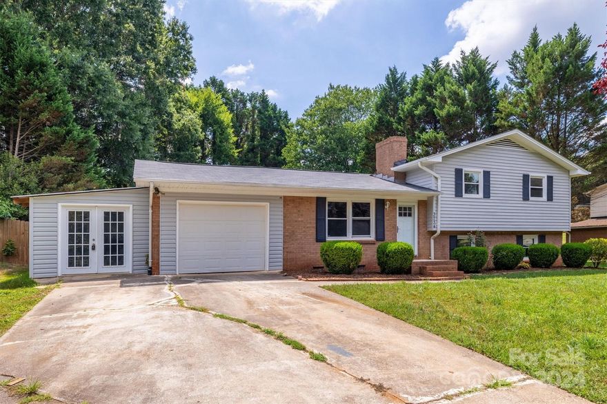 Tons of space and upgrades for a great price in this home! Located near schools in an established neighborhood with an INGROUND POOL. The basement offers what could be a primary bedroom with en suite full bath offering a custom tiled large shower or could be a great family room! Find 3 other bedrooms above with ample closet space and a full bath w/ dual vanity! You will love the upgrades...fresh interior paint, LVP wood flooring, cabinetry, appliances, doors, lighting, septic pumped, granite counters, and more! Enjoy the open and spacious eat-in kitchen and living room. Find tons of storage space in the area/workshop connected to the garage and on-site storage building. Don't miss out! Seller offering $5000 towards buyer closing cost with acceptable offer!