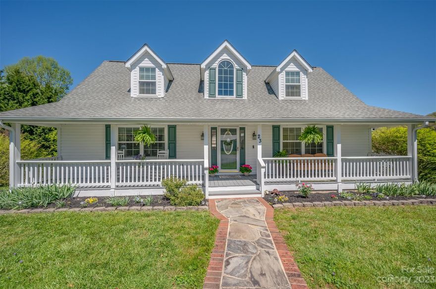 Crab Creek Valley gem with ample views of Pinnacle Mtn- just minutes to Dupont, Pisgah, Ride Kanuga, Flat Rock and downtown Hendersonville! Spacious, bright, multi-level meticulously maintained Cape Cod home with plenty of space for family/guests plus an RV garage (40x60) with workshop (plumbed and electric) for all your toys! Multiple mountain views! Generous primary on main level, ample guest rooms upstairs . Eat-in Kitchen with Frigidaire Professional appliances, island and walk in pantry; cozy family room with fireplace, airy sunroom and plenty of storage. Showings start on APRIL 19th.