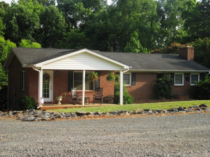 If rocking chair front porch living is what you desire then this updated brick ranch with a private country setting on almost 1.5ac of land is the home for you. This tastefully decorated 3 bed home is move in ready with an open floor plan that's just waiting for you to entertain and enjoy the country side from the back deck. A large master suite with a cozy fire place and great closet space for the lady of the house and a large barn/storage building for the man. Great location, a must see.