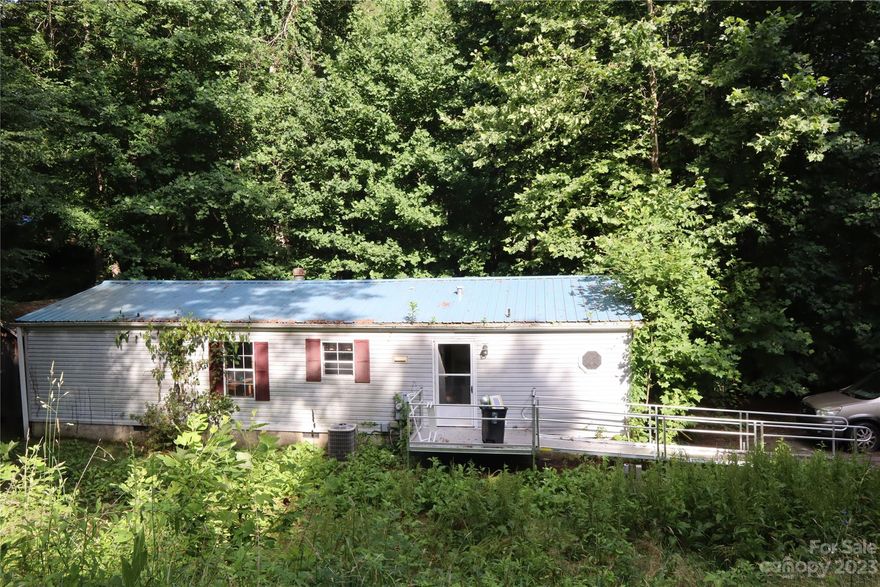 Estate sale! Oversized lot in Clover Fields. Home is being sold "As-Is". Great location....close to Asheville and Weaverville. Bring all offers!