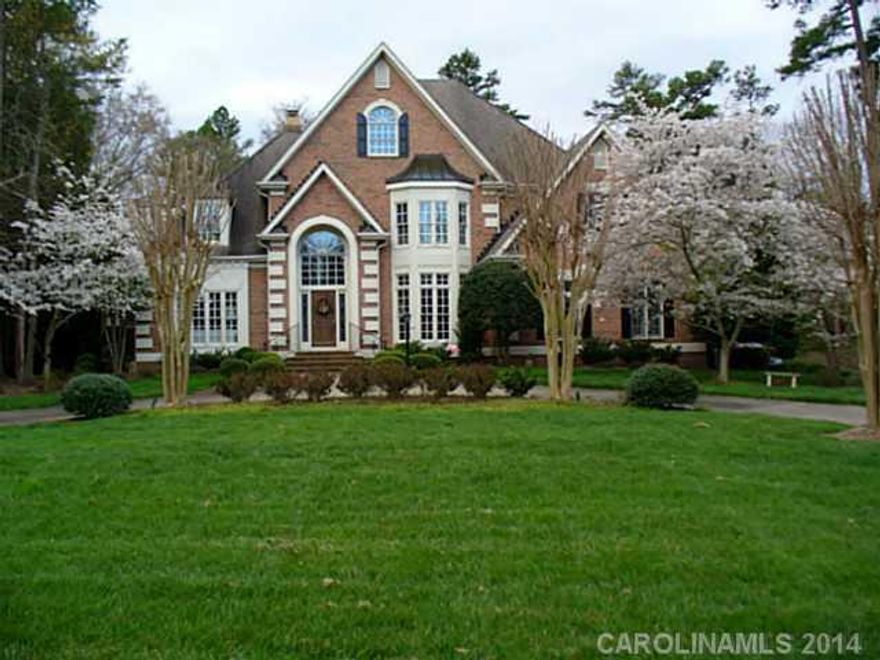 Gorgeous Grimmer built home on flat .96 ac w/ circular drive. Renovated, gourmet kitchen w/ large keeping area. 1st floor master suite w/ serene updated bath. Fantastic 2-story great rm w/ fireplace, beautiful moldings & built-ins overlooks expansive yard & brick patio. 3 lg bdrms up all w/ direct access to baths. Also, huge bonus/5th bdrm in addition to 3rd floor rec rm off of bdrm #4. Stunning!