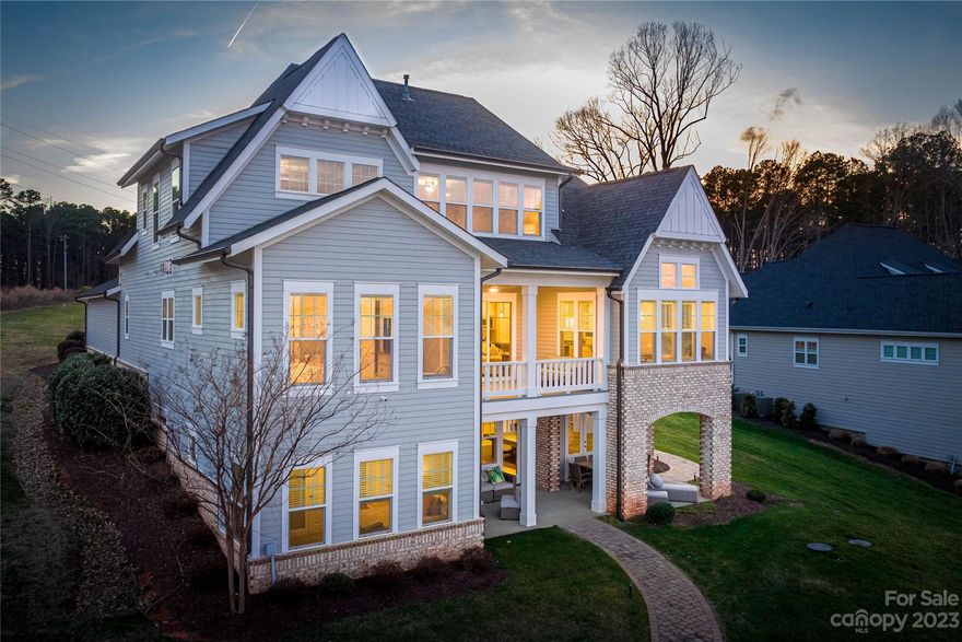 Luxury abounds in this breathtaking Lake Norman waterfront home. Take in expansive water views from nearly every room of this 2018 built home, while you experience privacy & the pristine shoreline of Lake Norman. With over 5000 sqft, this home is well appointed w/ both beauty & function. Primary on main w/ deep soaking tub in adjoining/primary bath. No detail has been overlooked in the quality craftsmanship of this home.