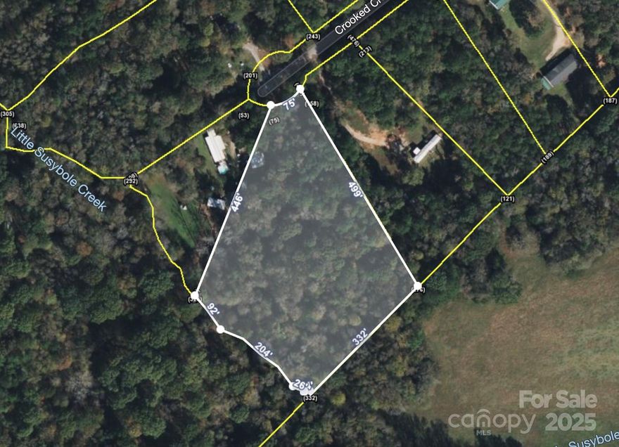 This large 4.62-acre wooded lot on a cul-de-sac is waiting for you to build your dream home! Tucked away in Farmwood Estates, it offers a quiet country setting that is also conveniently located just a short drive from shopping and dining. It's also close to Hwy 321. Come see this property, today!